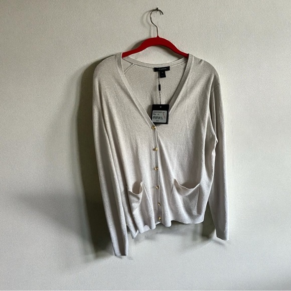 Stunning sparkly cardigan. Pictures don’t do it justice. NWT and never worn!